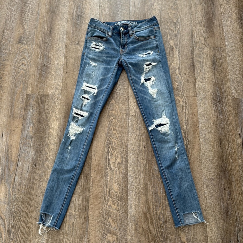 American Eagle Outfitters Blue Distressed Super Stretch Skinny Jeans